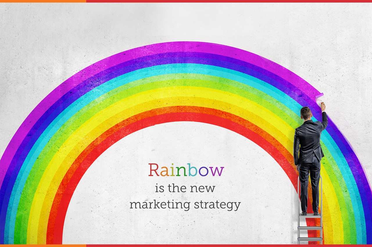 LGBTQ - a businessman drawing a rainbow on the wall, calling it his new marketing strategy