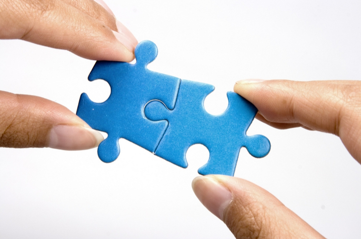 images and text - two hands putting together pieces of jigsaw puzzle