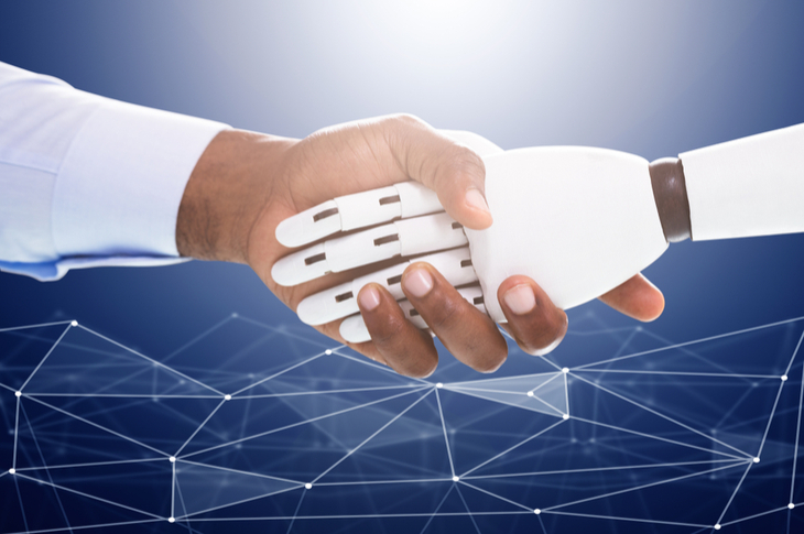 content marketer and artificial intelligence shaking hands